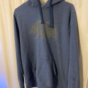 dark blue north face men size large hoodie with bear on the front